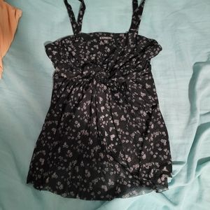 Medium Express tank-top blouse. Black with white floral design.